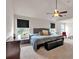 Spacious main bedroom with carpet, fan, and ensuite bathroom at 2239 Noelle Pl, Powder Springs, GA 30127