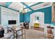 Bright home office featuring coffered ceilings, teal walls, and stylish furnishings at 2239 Noelle Pl, Powder Springs, GA 30127