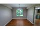 Bright dining room with hardwood floors and a chandelier, perfect for Gathering meals at 315 Marley Dr, Atlanta, GA 30349