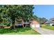 Charming two-story home featuring a spacious front yard and a two-car garage at 315 Marley Dr, Atlanta, GA 30349