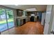 Bright kitchen featuring updated appliances, wood floors, and access to the backyard at 315 Marley Dr, Atlanta, GA 30349