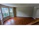 Bright living room featuring hardwood floors and large windows providing natural light at 315 Marley Dr, Atlanta, GA 30349