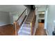 Interior view of the home showing staircase with wood railing leading upstairs at 315 Marley Dr, Atlanta, GA 30349