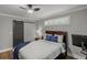 Bedroom features ceiling fan, natural light with access to the barn door creating a cozy space at 528 Allendale Dr, Decatur, GA 30032