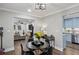Open dining area showcasing hardwood floors connecting to kitchen and living room at 528 Allendale Dr, Decatur, GA 30032