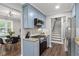 Well-equipped kitchen with granite countertops, stainless steel appliances, blue cabinets, and easy access to dining area at 528 Allendale Dr, Decatur, GA 30032