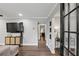 Open-concept living room with hardwood floors, modern decor and bright lighting at 528 Allendale Dr, Decatur, GA 30032