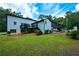 Newly renovated home with a two-tiered deck and a spacious yard backing up to a pond at 871 Cowan Se Rd, Conyers, GA 30094