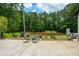 This home includes a lovely patio area with scenic views of the tranquil pond at 871 Cowan Se Rd, Conyers, GA 30094