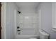 Updated bathroom with a shower and tub combo at 871 Cowan Se Rd, Conyers, GA 30094