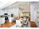 Open-concept dining area next to the kitchen, features hardwood floors and great lighting at 871 Cowan Se Rd, Conyers, GA 30094