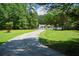 Long driveway leading to home at 871 Cowan Se Rd, Conyers, GA 30094