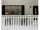 Exterior view of front porch with rocking chairs at 871 Cowan Se Rd, Conyers, GA 30094