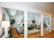 Open-concept living room with a fireplace and hardwood floors, perfect for entertaining at 871 Cowan Se Rd, Conyers, GA 30094
