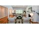 Bright living room with fireplace, hardwood floors, and large windows offering natural light at 871 Cowan Se Rd, Conyers, GA 30094