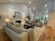 Cozy living room featuring a fireplace, comfortable sofa, and neutral decor at 871 Cowan Se Rd, Conyers, GA 30094