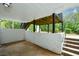 Lower patio is brick with access to backyard, perfect for entertaining at 871 Cowan Se Rd, Conyers, GA 30094