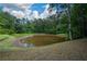 Enjoy the tranquility of this private pond surrounded by natural beauty and wildlife at 871 Cowan Se Rd, Conyers, GA 30094