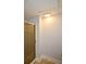 The bathroom features a shower with gold trim and a frosted door at 871 Cowan Se Rd, Conyers, GA 30094