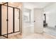 Bright bathroom with glass-enclosed shower and soaking tub at 11910 Brightside Pkwy, Hampton, GA 30228