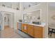 Bright kitchen with stainless steel appliances, ample counter space, and wooden cabinetry at 1865 Morgans Run Trl, Buford, GA 30519