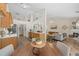 Open-concept kitchen and living room with vaulted ceilings, providing a spacious and connected area at 1865 Morgans Run Trl, Buford, GA 30519