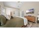 Bright and spacious main bedroom featuring vaulted ceilings, ensuite bathroom, and modern decor at 1865 Morgans Run Trl, Buford, GA 30519