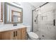 Modern bathroom with new vanity, toilet and beautiful updated shower at 2649 Lake Harbin Rd, Morrow, GA 30260
