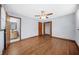 Spacious bedroom with hardwood floors, ceiling fan, and natural light from window at 2649 Lake Harbin Rd, Morrow, GA 30260