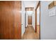 Hallway with hardwood floors, and access to multiple rooms in the home at 2649 Lake Harbin Rd, Morrow, GA 30260