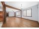 Bright and airy living room featuring hardwood floors and large windows at 2649 Lake Harbin Rd, Morrow, GA 30260