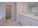 Bright bathroom with dual vanities and walk in closet access at 48 Beaver Pt, Villa Rica, GA 30180