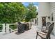 Back deck with seating and grill area at 340 Chandler Ct, Sugar Hill, GA 30518