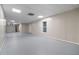 Unfinished basement with large open area, ideal for storage or future customization at 340 Chandler Ct, Sugar Hill, GA 30518