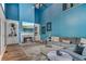 Cozy living room with a marble fireplace, built-in shelves, and comfortable seating at 340 Chandler Ct, Sugar Hill, GA 30518