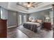Main bedroom features gray walls, carpet, trey ceilings, and abundant natural light at 340 Chandler Ct, Sugar Hill, GA 30518