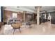 Spacious loft-style living room with exposed brick walls, concrete pillars, and an open-concept layout at 434 Marietta Nw St # 301, Atlanta, GA 30313