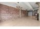 Open living space with exposed brick, modern lighting, and an open floor plan ready for personalization at 434 Marietta Nw St # 301, Atlanta, GA 30313