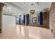 Spacious living room with exposed brick and industrial-style windows, providing abundant natural light at 434 Marietta Nw St # 301, Atlanta, GA 30313