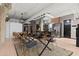Spacious open floor plan with lofted ceilings, exposed brick, modern kitchen, and dining area at 434 Marietta Nw St # 301, Atlanta, GA 30313