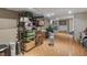 Unfinished basement with tile flooring, wire shelving, and laundry area at 6 Water View Dr, Stockbridge, GA 30281