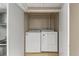 Laundry room featuring a washer, dryer, and utility sink at 6 Water View Dr, Stockbridge, GA 30281