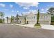 Street view of newly constructed townhomes showing architectural details and landscaping at 113 Priestwood Ln, Acworth, GA 30102