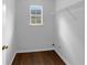 Bright closet space featuring a window and a wire shelf for optimal storage solutions at 2397 Charleston Ter, Decatur, GA 30034