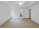Large primary bedroom featuring a tray ceiling and neutral carpet at 2397 Charleston Ter, Decatur, GA 30034