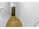 Carpeted stairs and a white railing lead to the upper level at 2397 Charleston Ter, Decatur, GA 30034