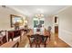 Formal dining room with hardwood floors, chandelier, and elegant furnishings at 30 Chaumont Nw Sq, Atlanta, GA 30327