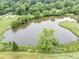Scenic pond surrounded by lush greenery and trees at 30 Chaumont Nw Sq, Atlanta, GA 30327