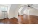 Versatile bonus room with hardwood floors and sloped ceilings at 585 Old Cobblestone Dr, Atlanta, GA 30350