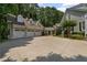 Charming home with a three-car garage and a spacious driveway at 585 Old Cobblestone Dr, Atlanta, GA 30350